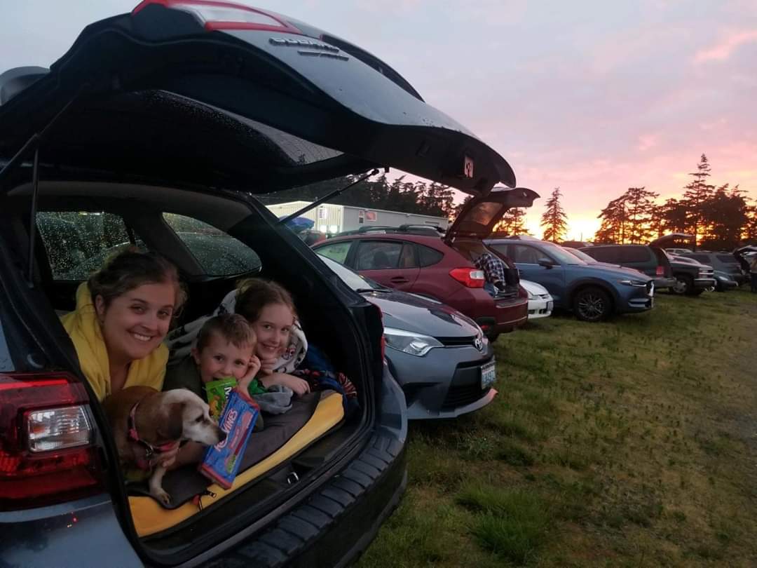 family in car at Blue Fox Drive in
